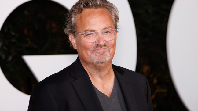 FILE - Matthew Perry arrives at the GQ Men of the Year Party on Thursday, Nov.17, 2022, in West Hollywood, Calif. Perry, who starred as Chandler Bing in the hit series “Friends,” has died. He was 54. The Emmy-nominated actor was found dead of an apparent drowning at his Los Angeles home on Saturday, according to the Los Angeles Times and celebrity website TMZ, which was the first to report the news. Both outlets cited unnamed sources confirming Perry’s death. His publicists and other representatives did not immediately return messages seeking comment. (Photo by Willy Sanjuan/Invision/AP, File)