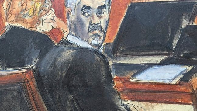 Sean 'Diddy' Combs, right, turns around and looks at the audience during jury selection at Manhattan federal court, Monday, May 5, 2025, in New York. (Elizabeth Williams via AP)